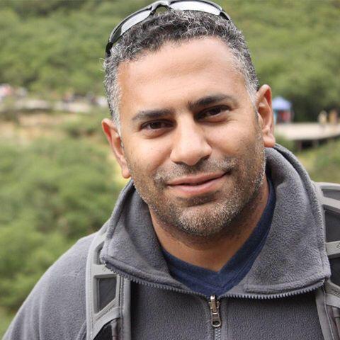 headshot of Rashad Sharaf